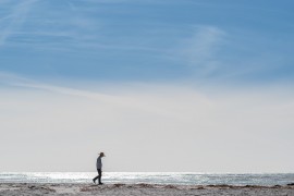 Mann am Strand